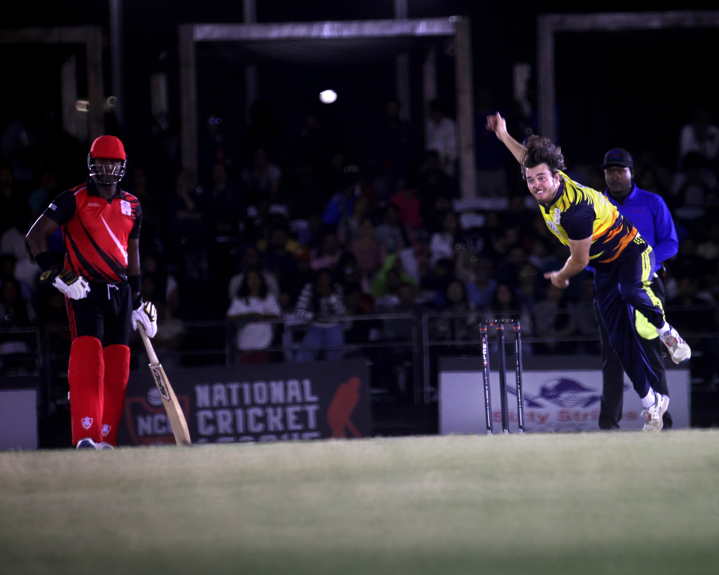 Chicago player #6 Ian Souness throws the ball as The Chicago Cricket Club plays against the...