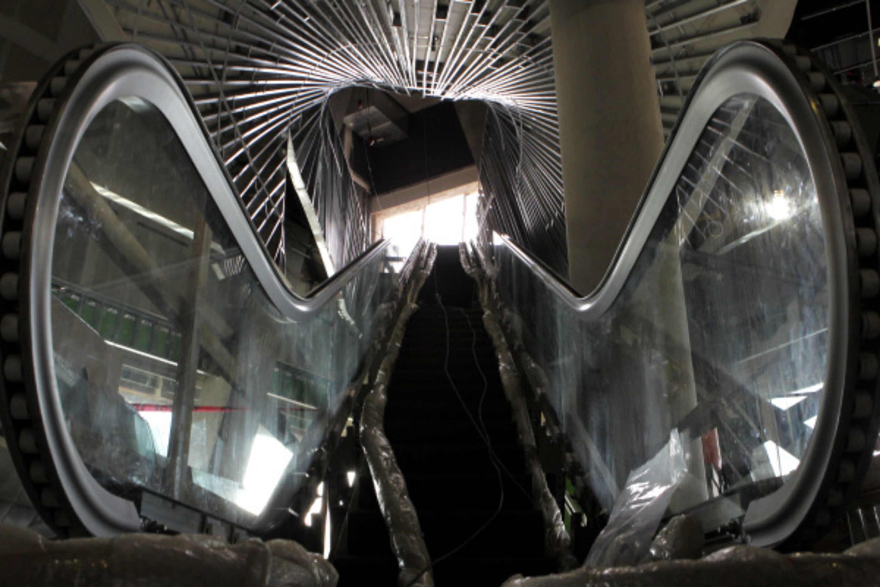 The entrance escalator that goes from the lobby to the museum, at the $185-million Perot...