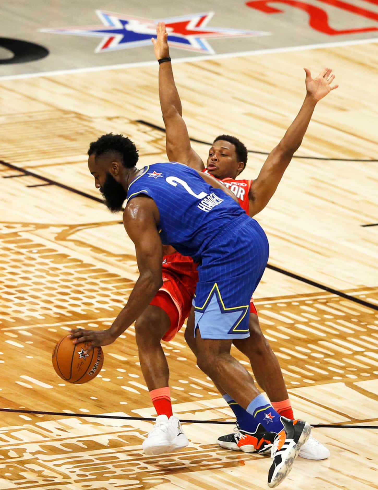 Team LeBron's James Harden (2) charges Team Giannis' Kyle Lowry (24) during the second half...