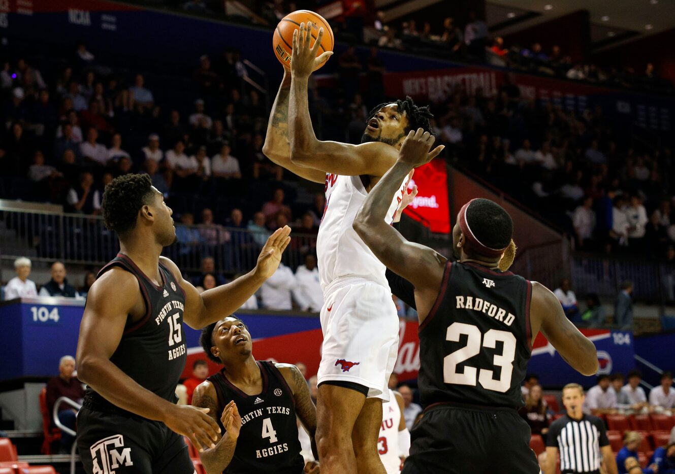 SMU forward Keon Ambrose-Hylton (22) attempts a jump shot as Texas A&M Aggies forward Henry...