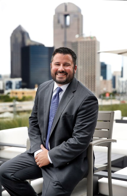 Uber's Texas public policy manager Chris Miller poses for a photo on the patio of The Epic.