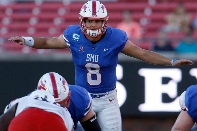 SMU quarterback Ben Hicks (8) goes through his snap count during an offensive drive in the...