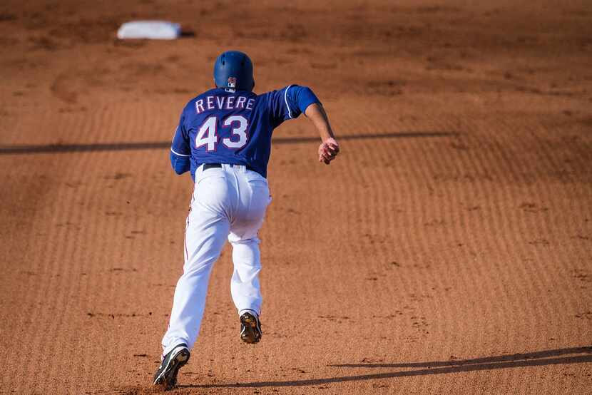 Texas Rangers outfielder Ben Revere takes off for second base during the eighth inning of a...