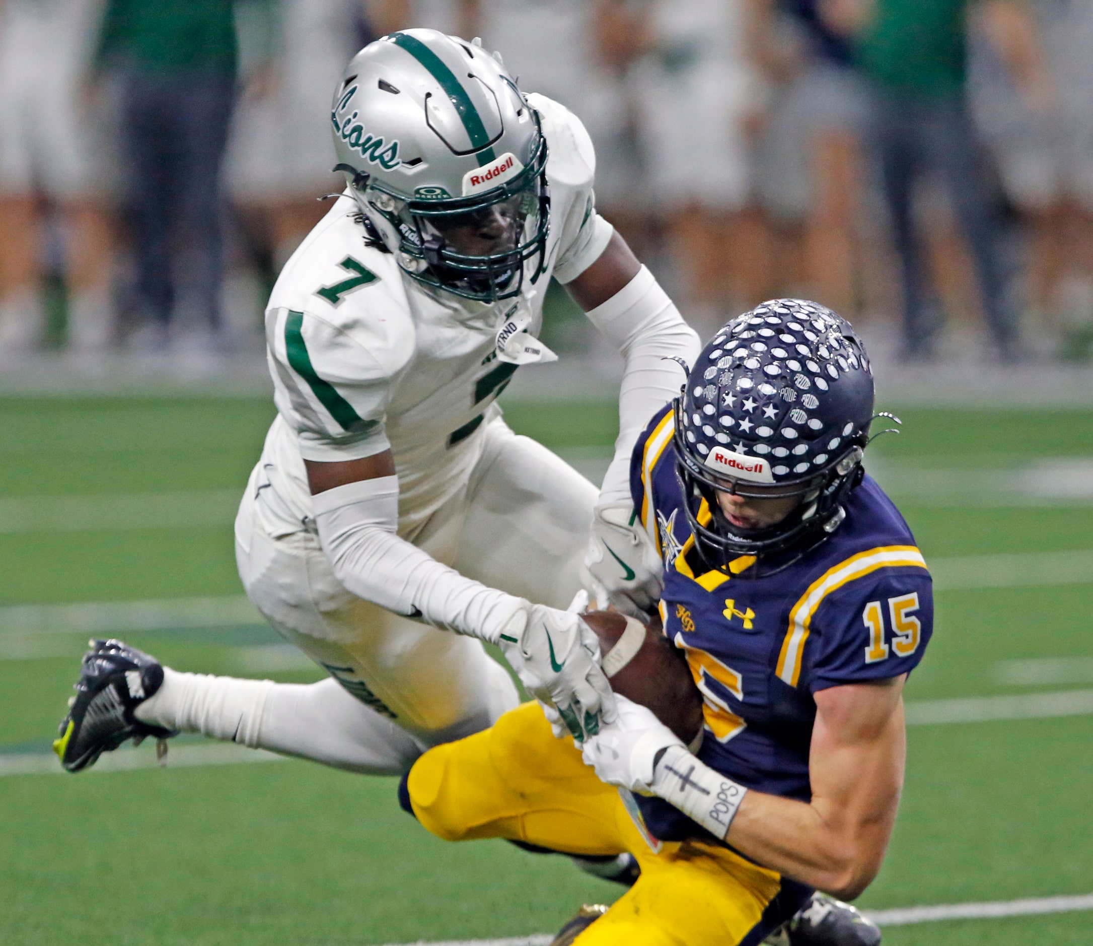 Frisco Reedy High  defender MD Awe (7) can’t stop Highland Park High Benton Owens (15) from...