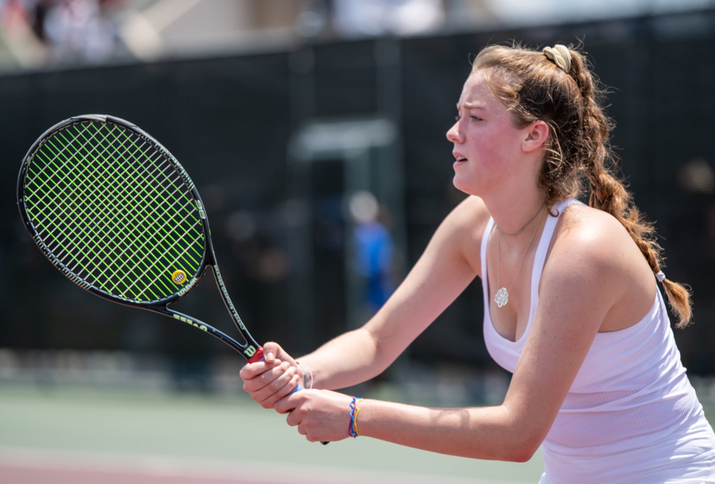 Grapevine's Madison Plowman waits to return the ball in a doubles match with teammate Reilly...