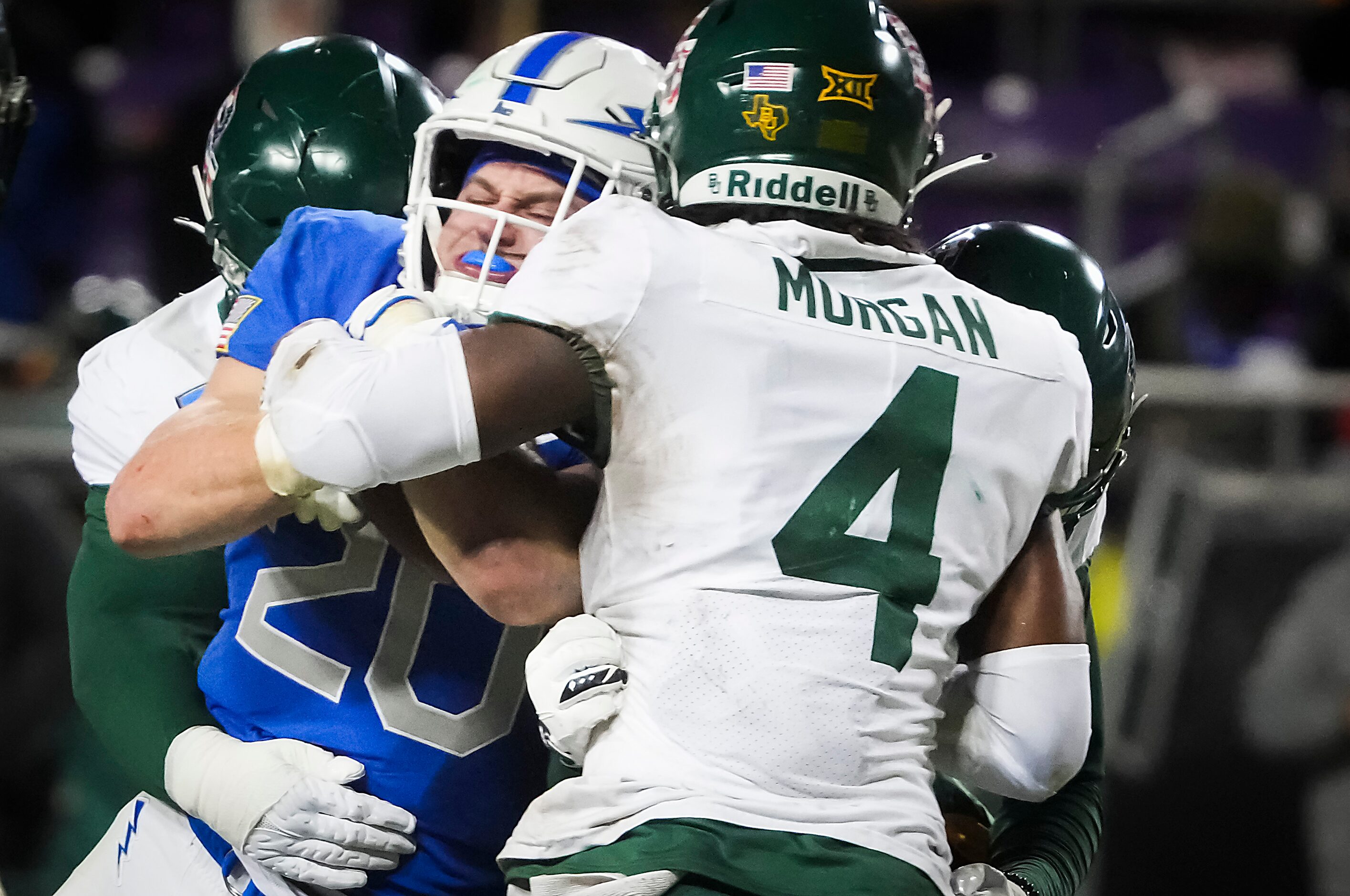 Air Force running back Brad Roberts (20) pushes for a first down against Baylor safety...