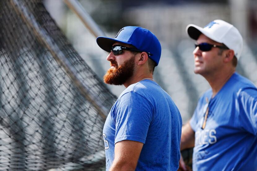 Tyler Toney of Dude Perfect waits next to the batting cage during training camp for Dirk...