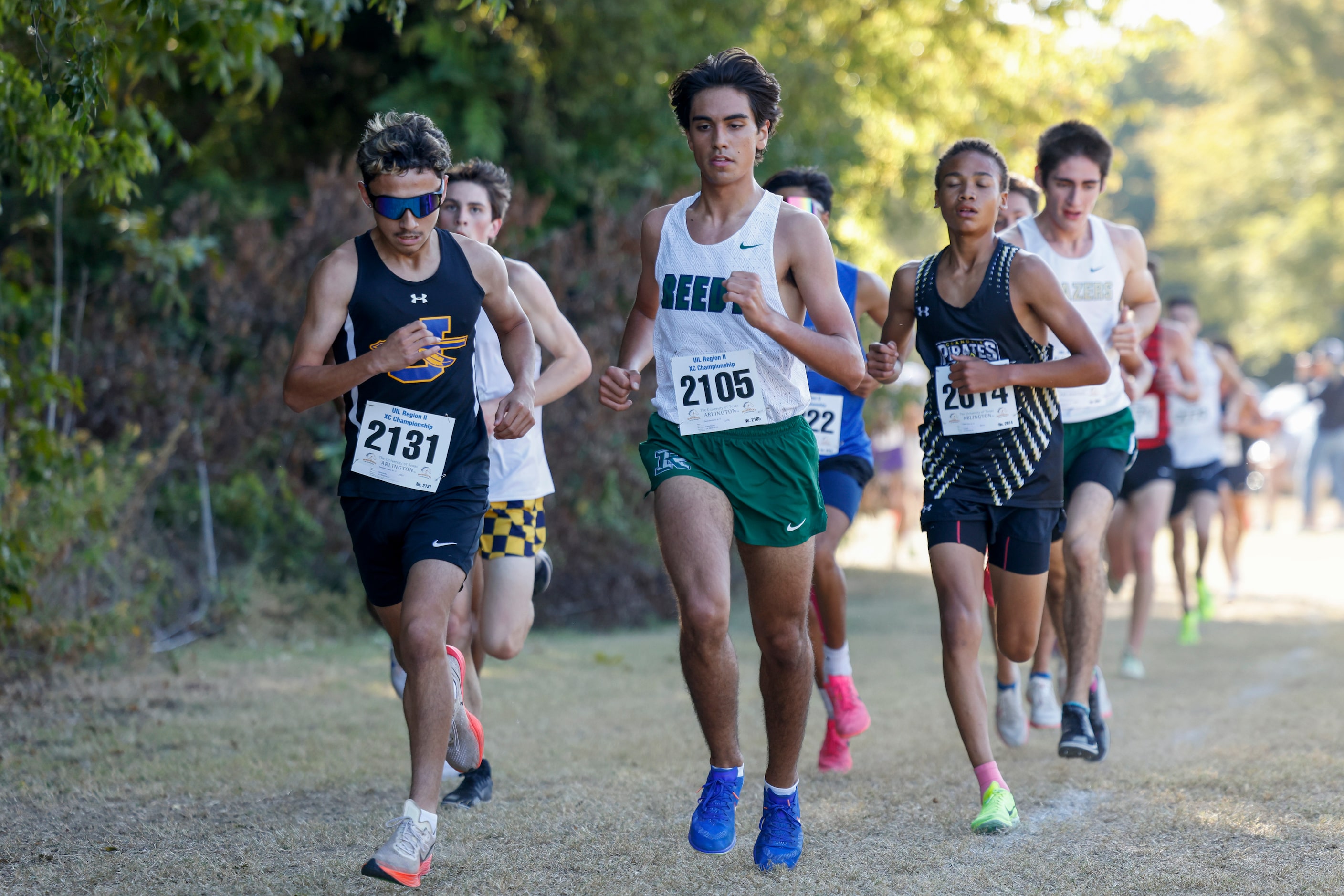 Frisco Reedy’s Daniel Escribano (right) runs alongside Jacksonville’s Sebastian Juarez...