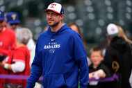 Texas Rangers pitcher Max Scherzer warms up before a baseball game against the Colorado...