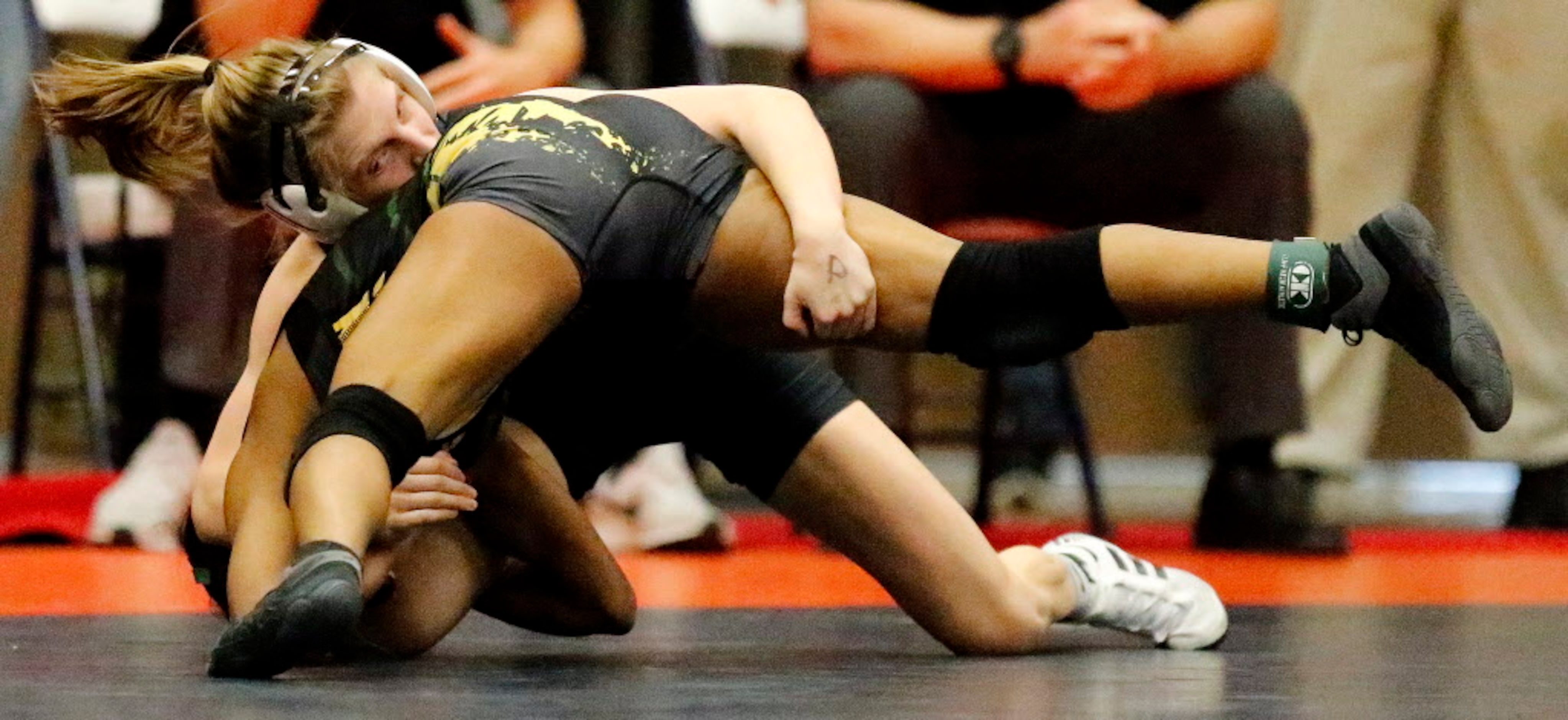 Savannah West (left) of Frisco Liberty High School competes with Salome Stallworth of Fort...