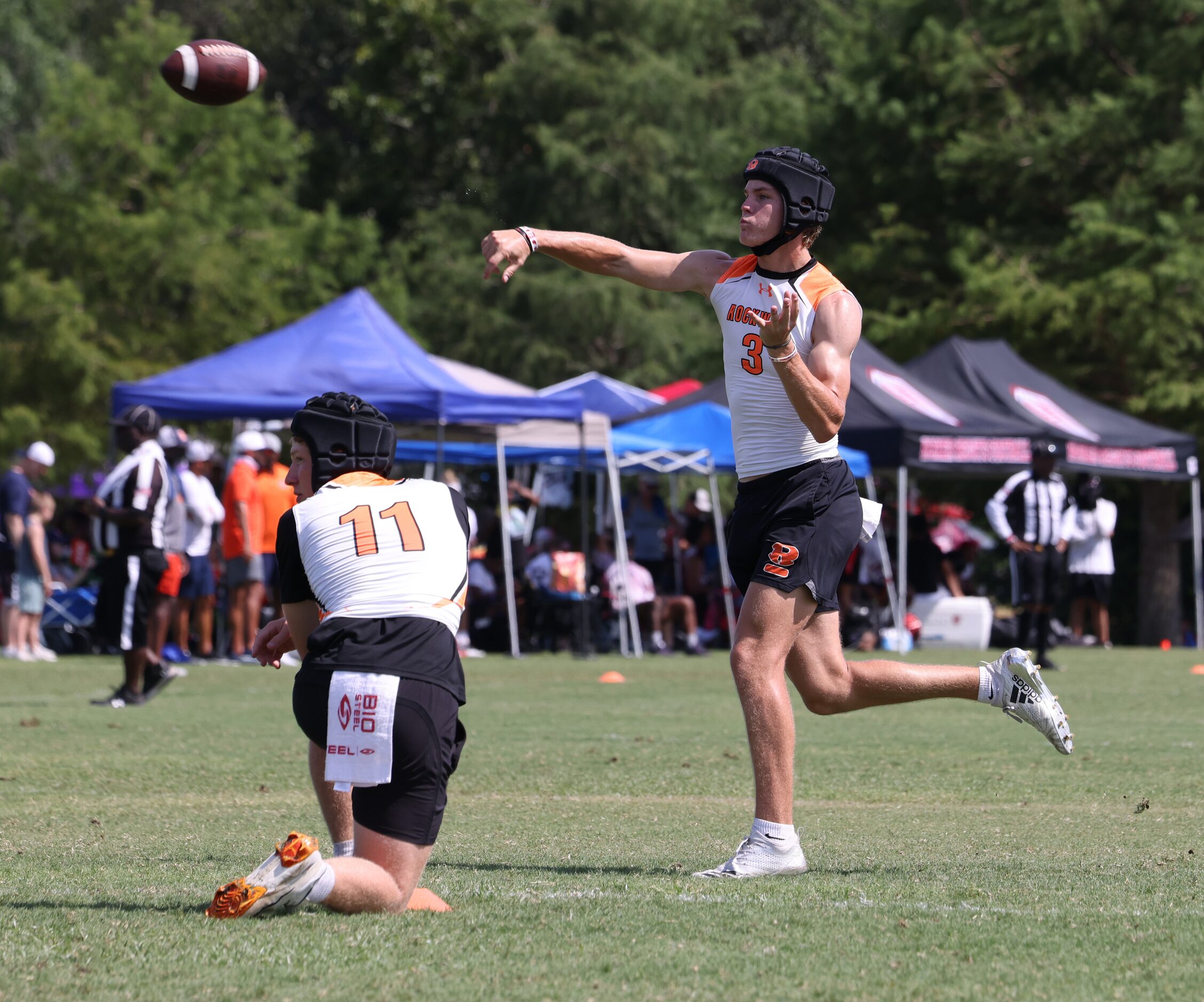 Rockwall quarterback Landyn Locke (3) launches a pass across the middle during first half...