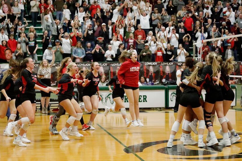 The Lovejoy High School bench rushes the team on the floor after completing a sweep in game...