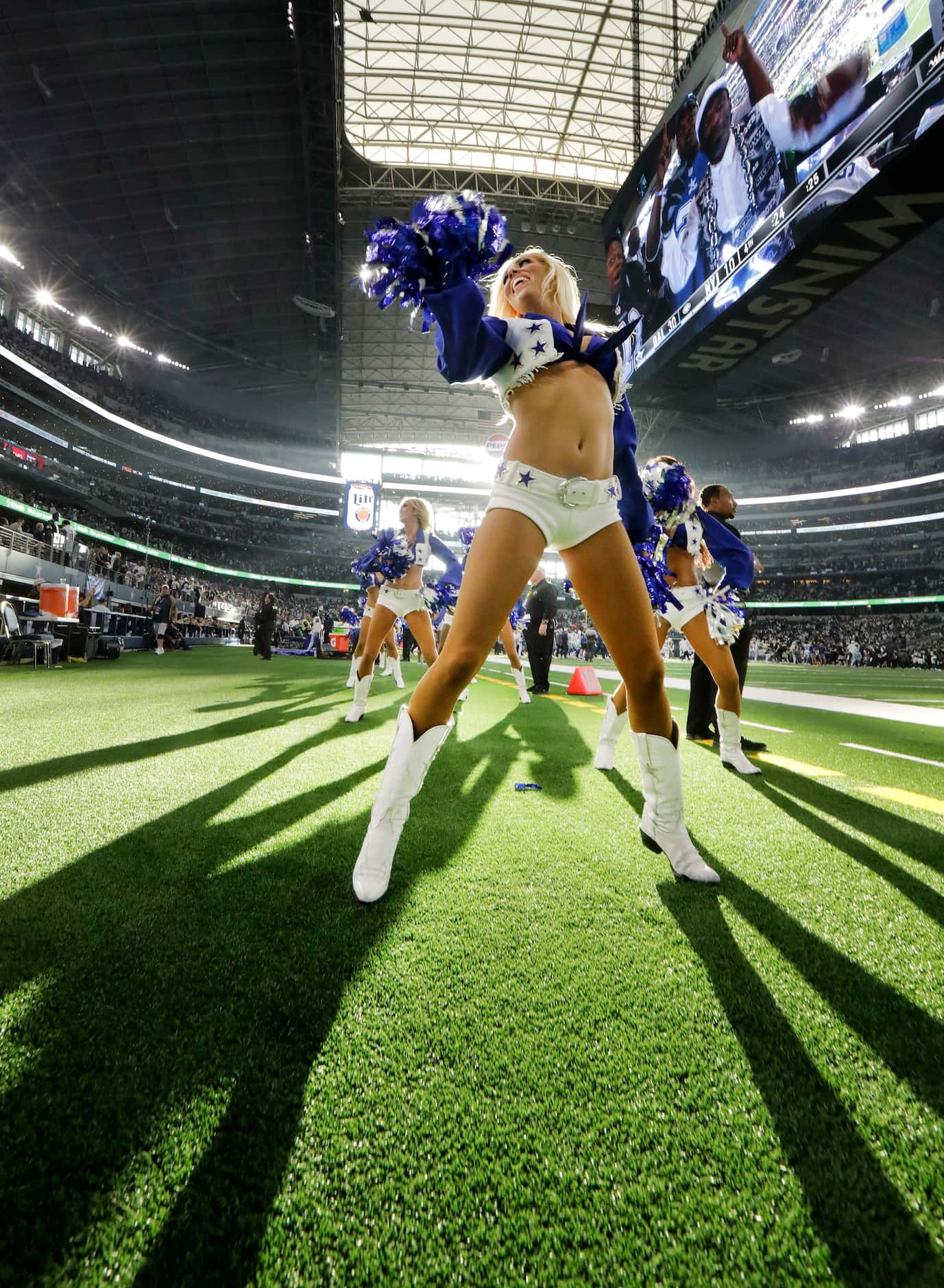 The Dallas Cowboys Cheerleaders perform during the second half of their home opener against...