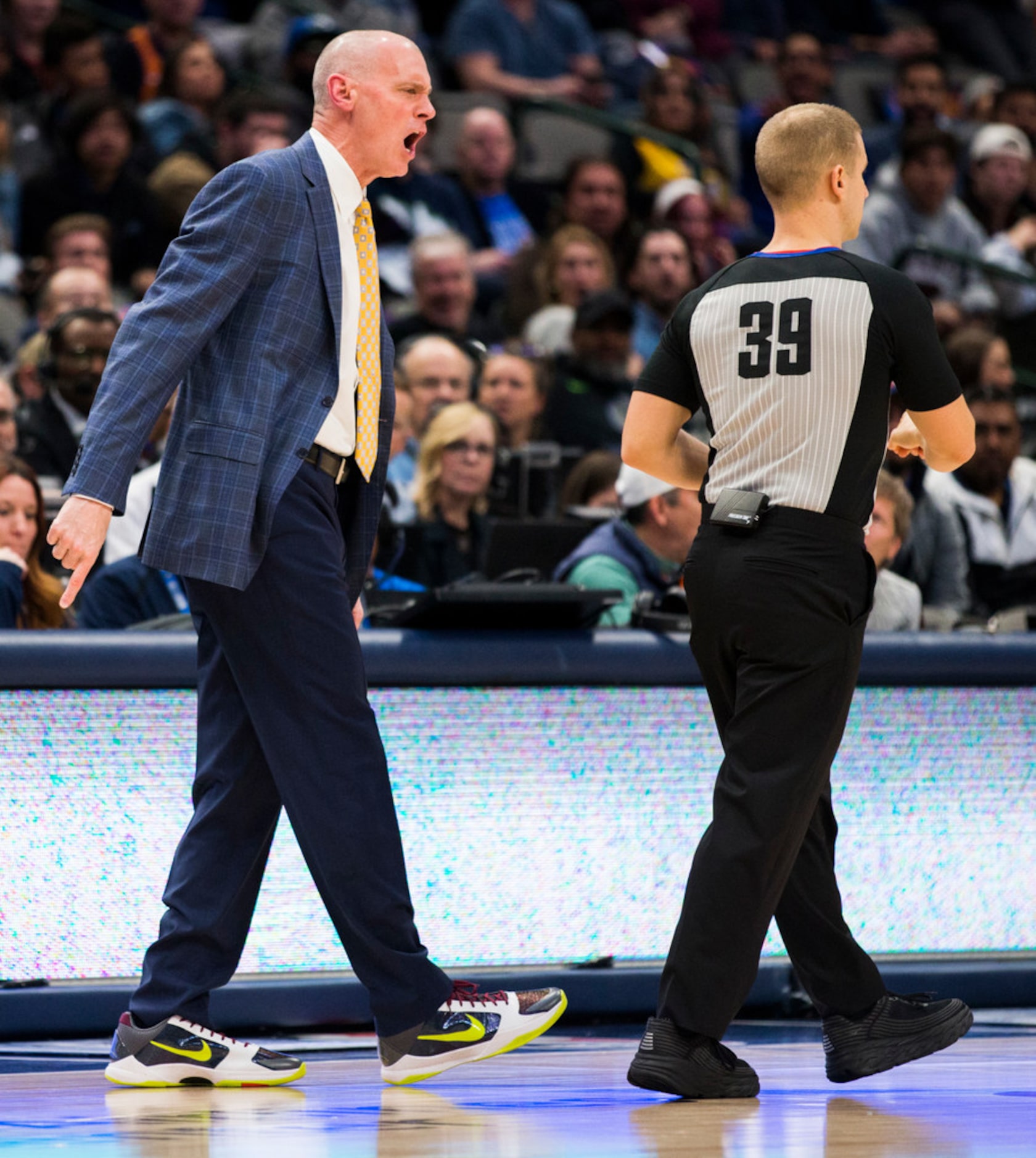 Dallas Mavericks head coach Rick Carlisle is given a penalty during the first quarter of an...