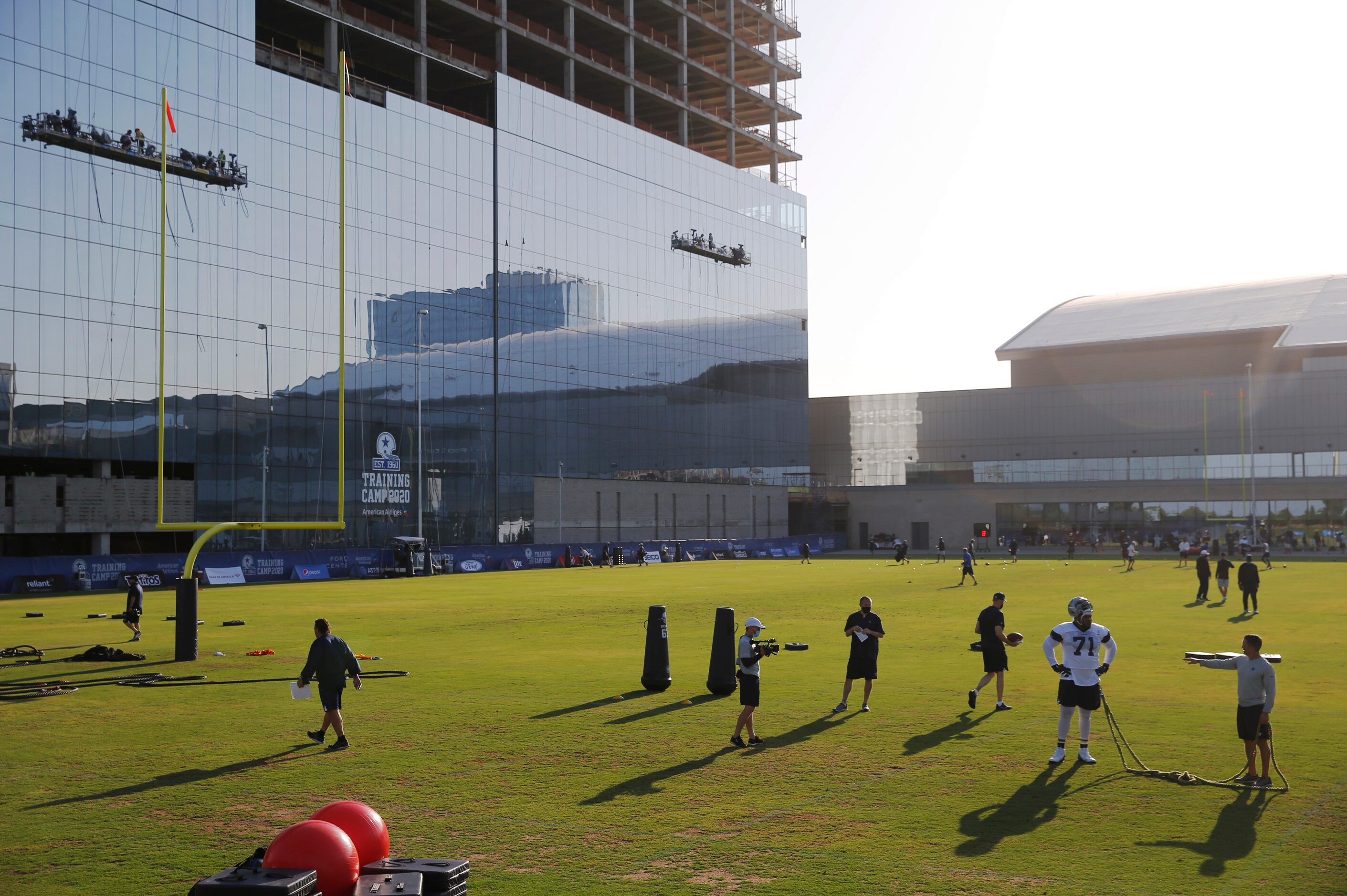 Dallas Cowboys offensive tackle La'el Collins (71) works with Dallas Cowboys trainer Britt...