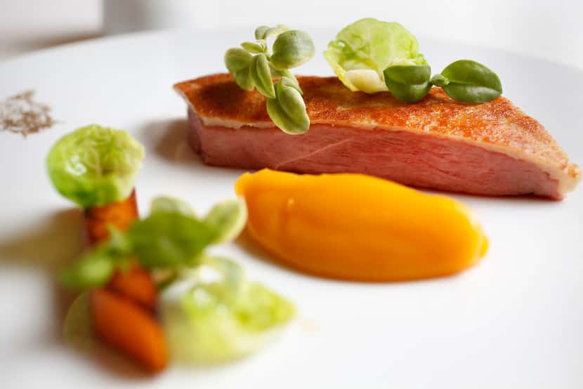 A main course of Long Island duck with butternut squash gel ($36)