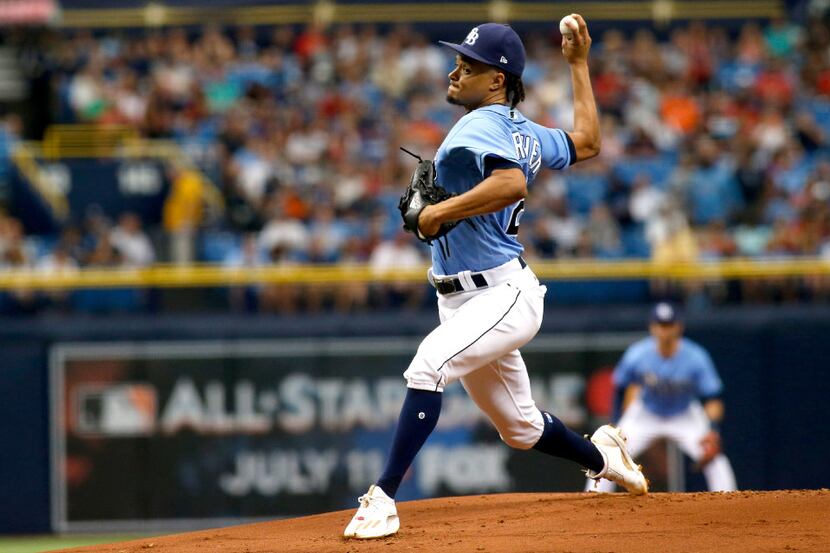 ST. PETERSBURG, FL - JULY 9:  Chris Archer #22 of the Tampa Bay Rays pitches during the...