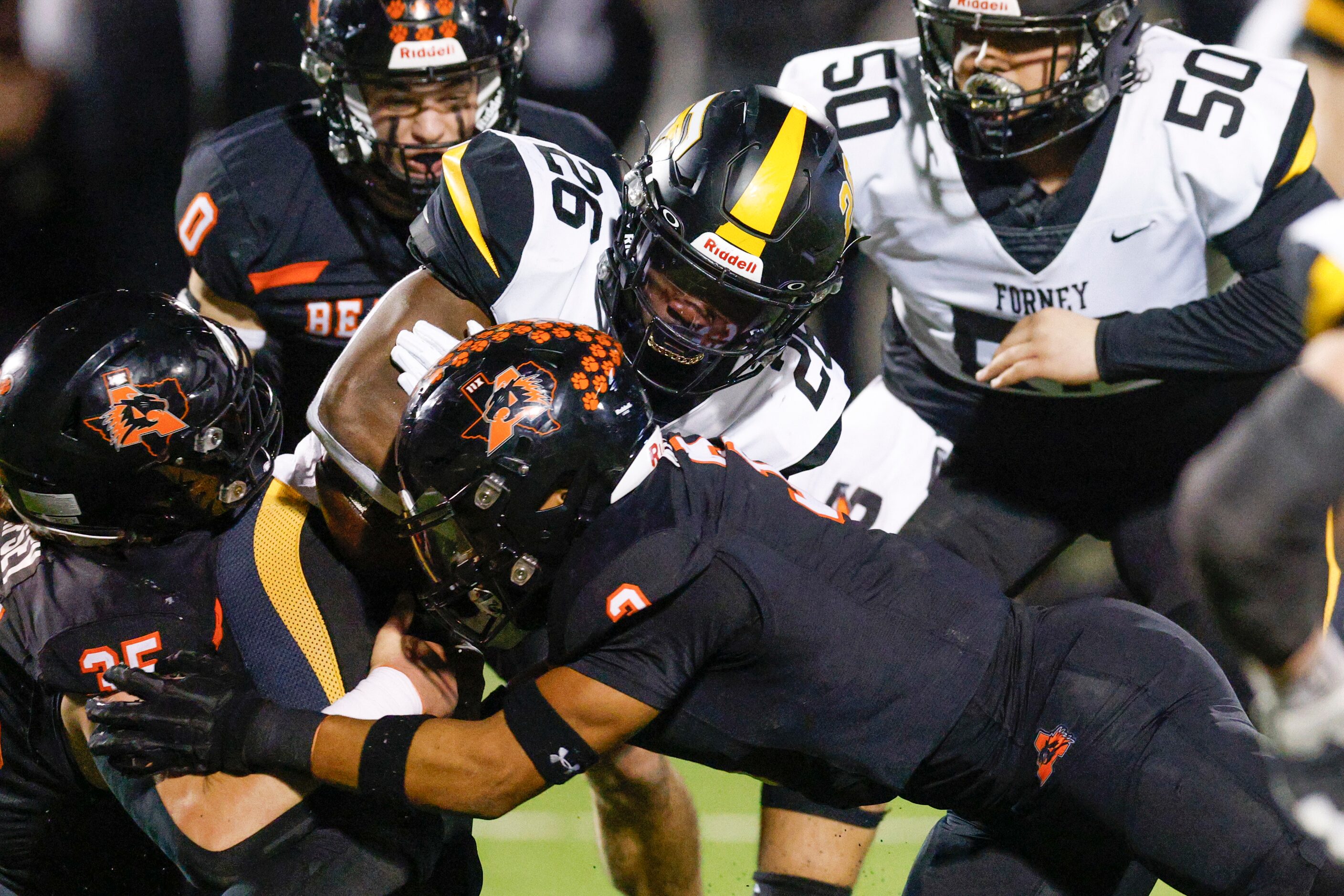 Aledo linebacker Davhon Keys (3) tackles Forney running back Javian Osborne (26) during the...