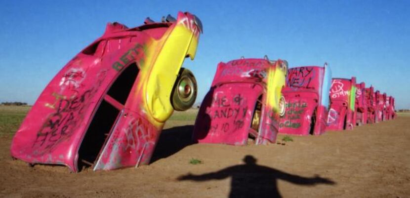 
The Cadillac Ranch, an art installation consisting of 10 vehicles with noses planted in the...