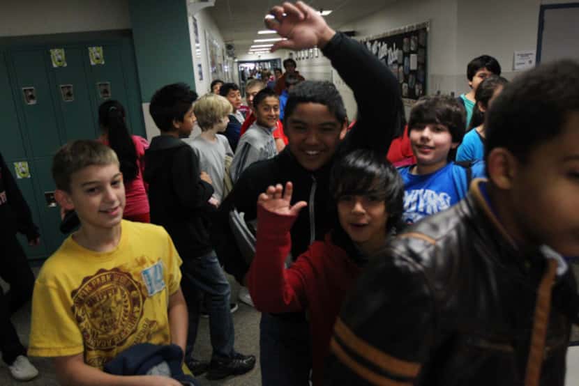 Student swarm the halls on their way to lunch at Staley Middle School in Frisco.