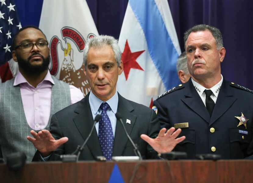 
Mayor Rahm Emanuel (center) said, “It’s fine to be passionate, but it is essential that it...