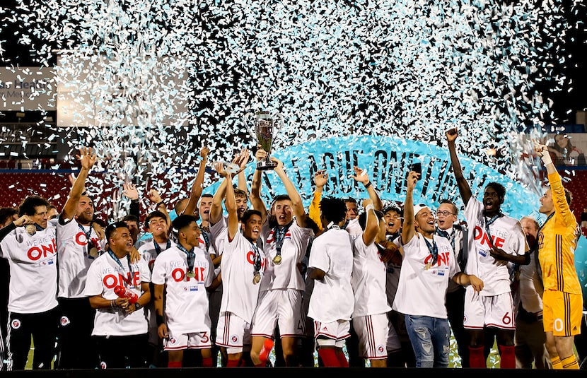 North Texas SC lifts the USL-1 Championship trophy following the USL League One Final won by...