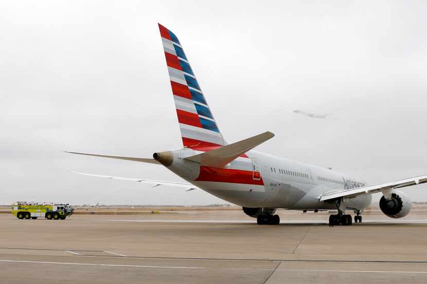 An American Airlines Boeing 787 Dreamliner at Terminal D of DFW International Airport on...