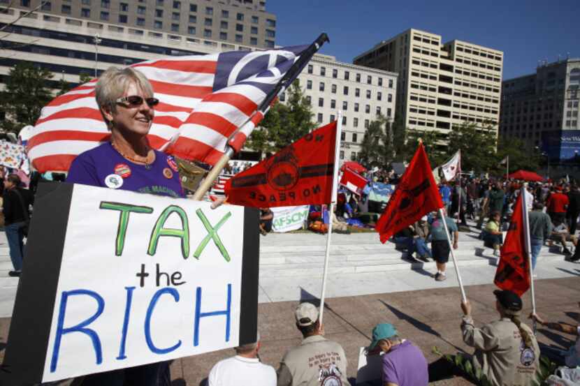 Most voters were wary of raising taxes to lower deficits. But nearly half favored increases...