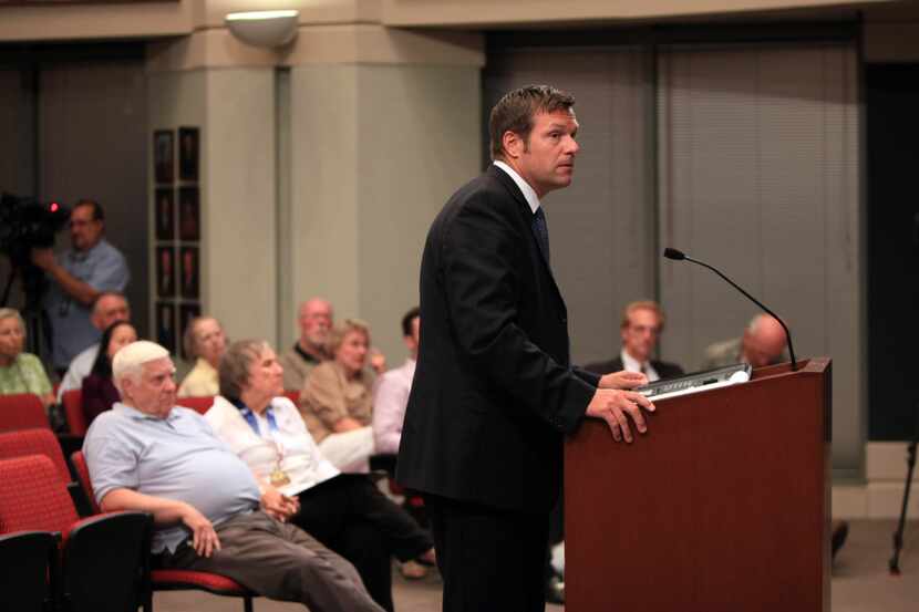 Kris Kobach spoke at a Farmers Branch City Council meeting in August 2013.