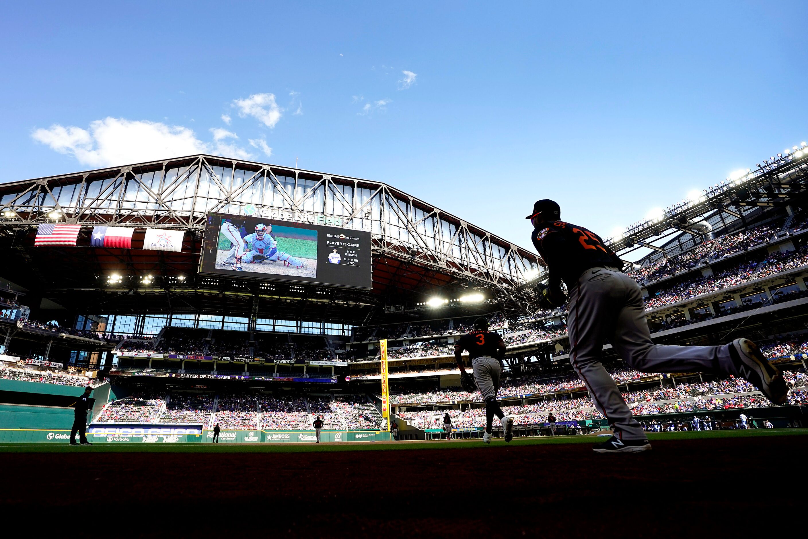 Baltimore Orioles right fielder Anthony Santander and third baseman Maikel Franco take the...