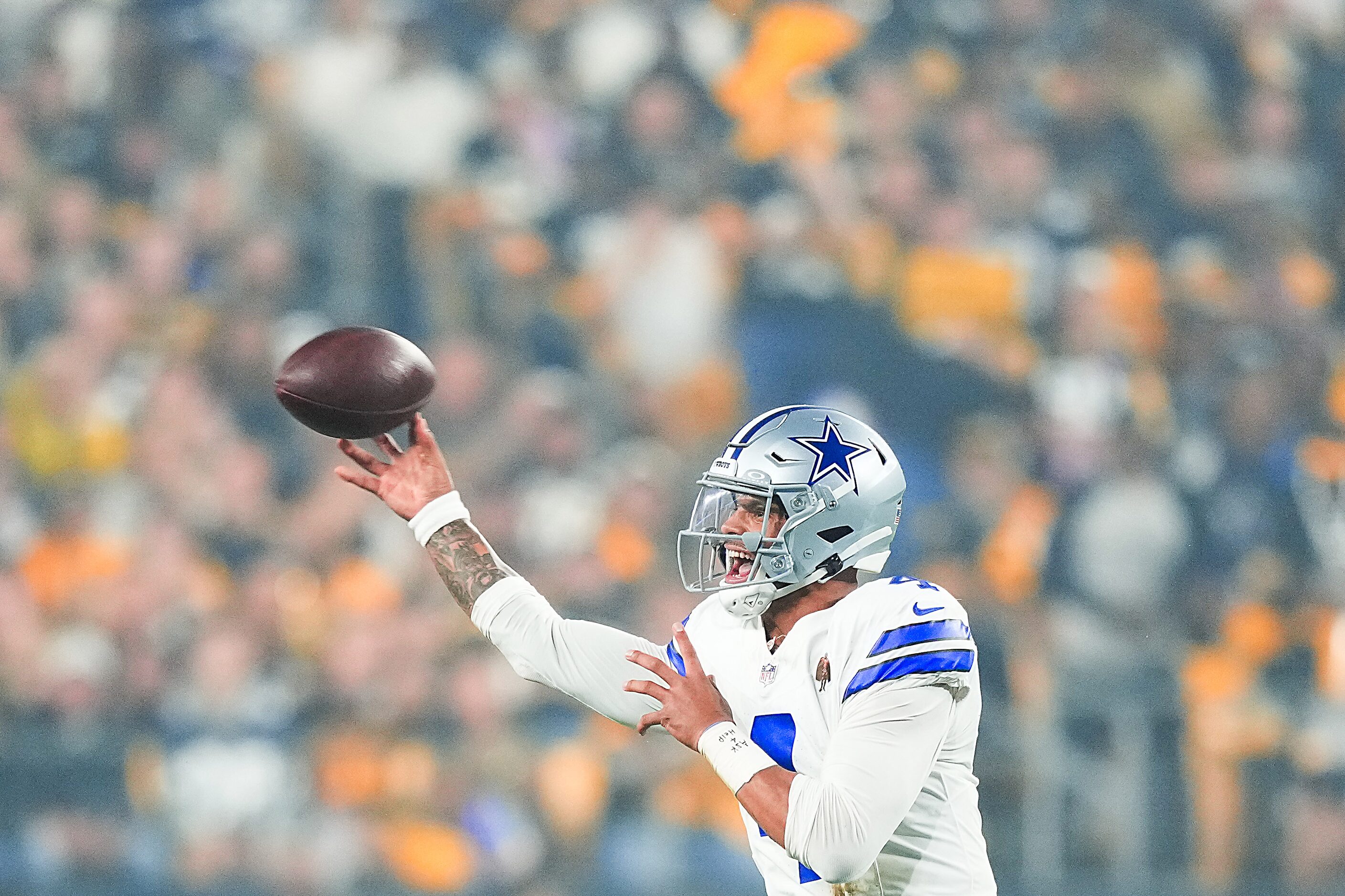 Dallas Cowboys quarterback Dak Prescott (4) throws a pass during the first half of an NFL...