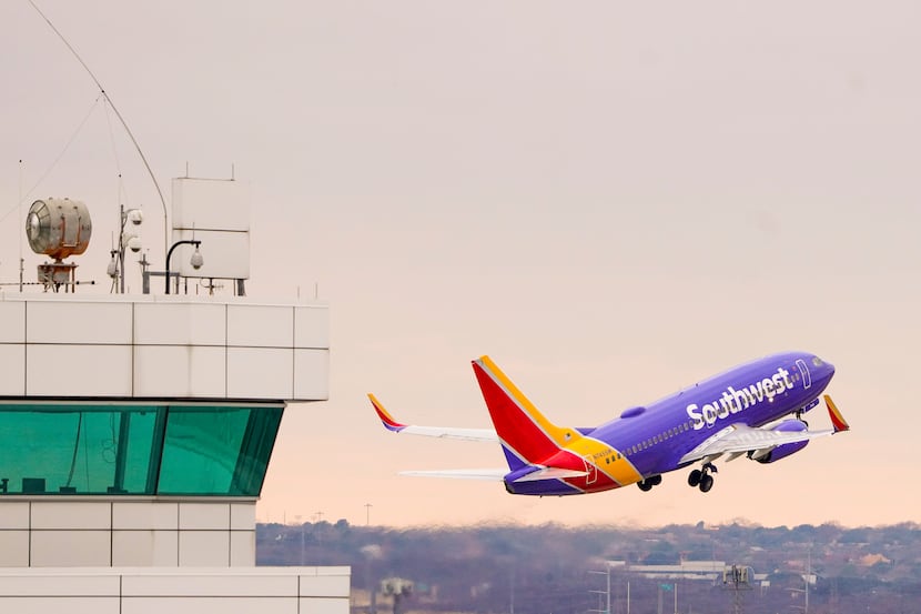 A Southwest Airlines flight takes off at Dallas Love Field on Thursday, Jan. 7, 2021, in...