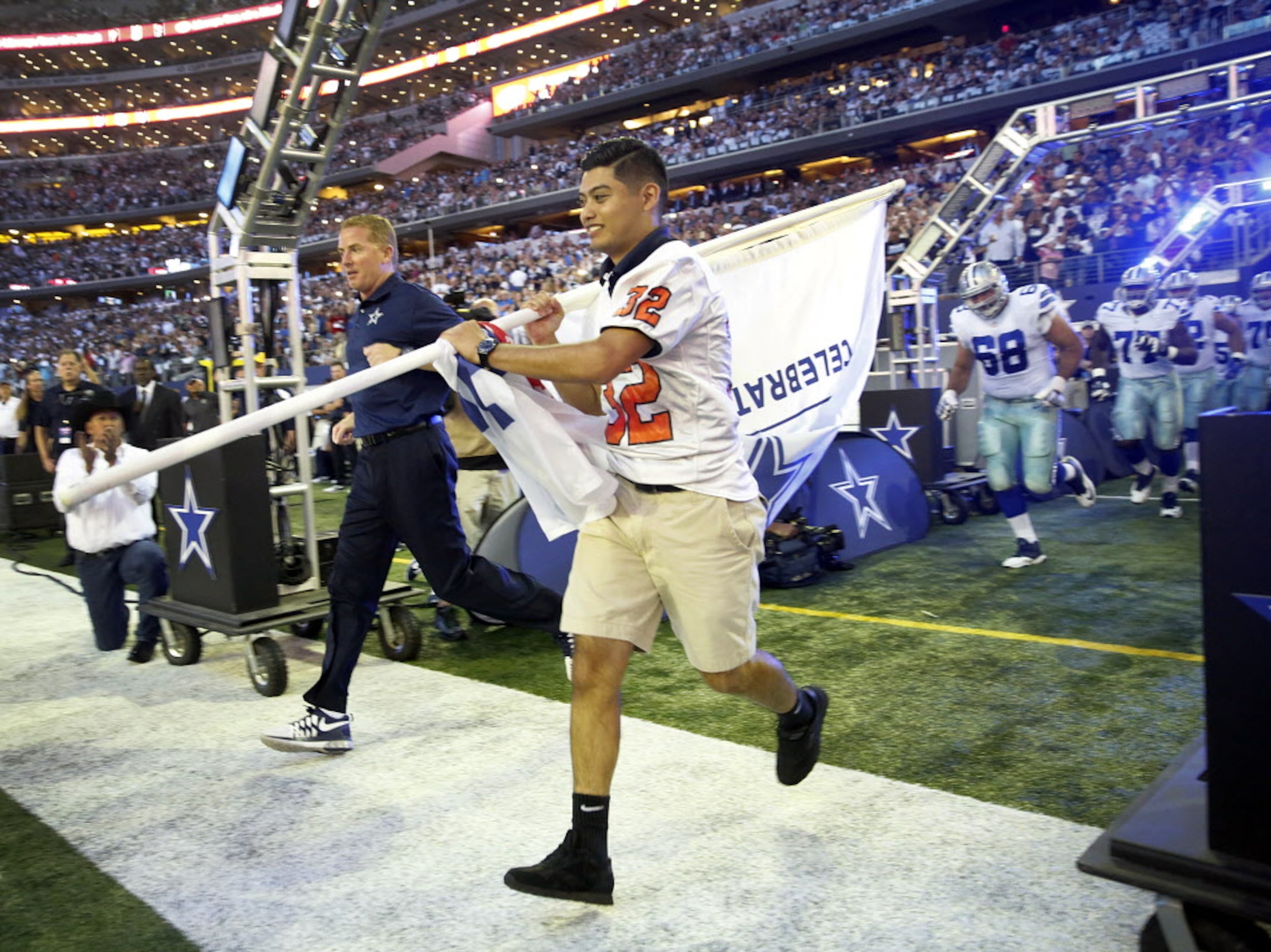 North Dallas High kicker/punter Luis Chaparro (right) and Dallas Cowboys head coach Jason...