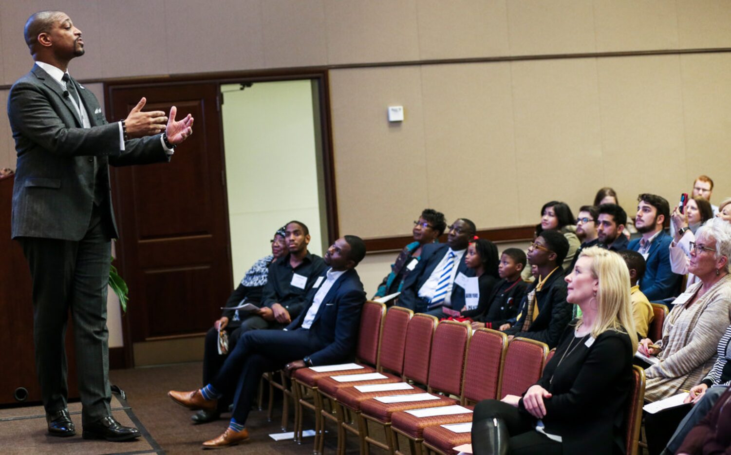 Rev. Starsky Wilson of St. Louis speaks during a panel discussion at Communities Foundation...