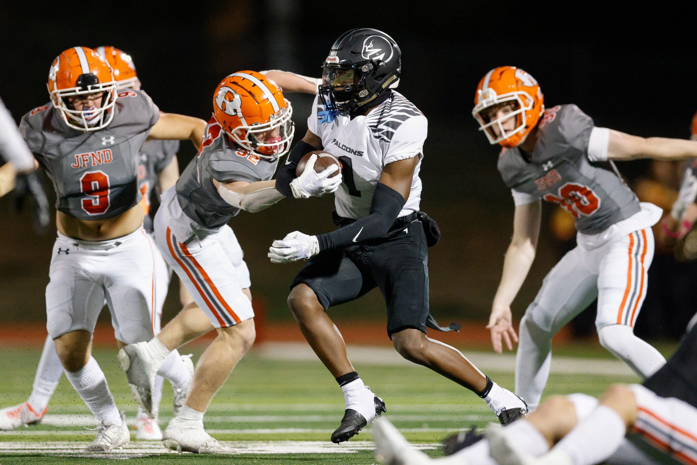 North Forney’s Amamii Branch (1) returns a kickoff during the first half of a District 10-6A...