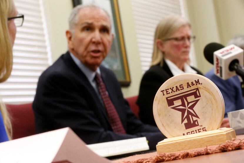 Texas A&M University President Michael K. Young makes remarks during Monday's briefing...