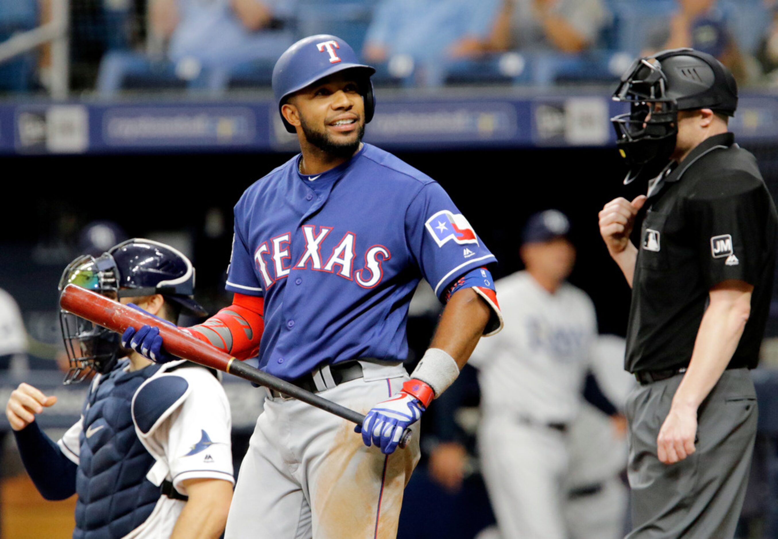 ST. PETERSBURG, FL - JUNE 29: Elvis Andrus #1 of the Texas Rangers smiles towards the stands...