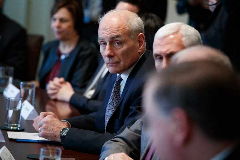 Homeland Security Secretary John Kelly listens during a session with President Donald Trump...