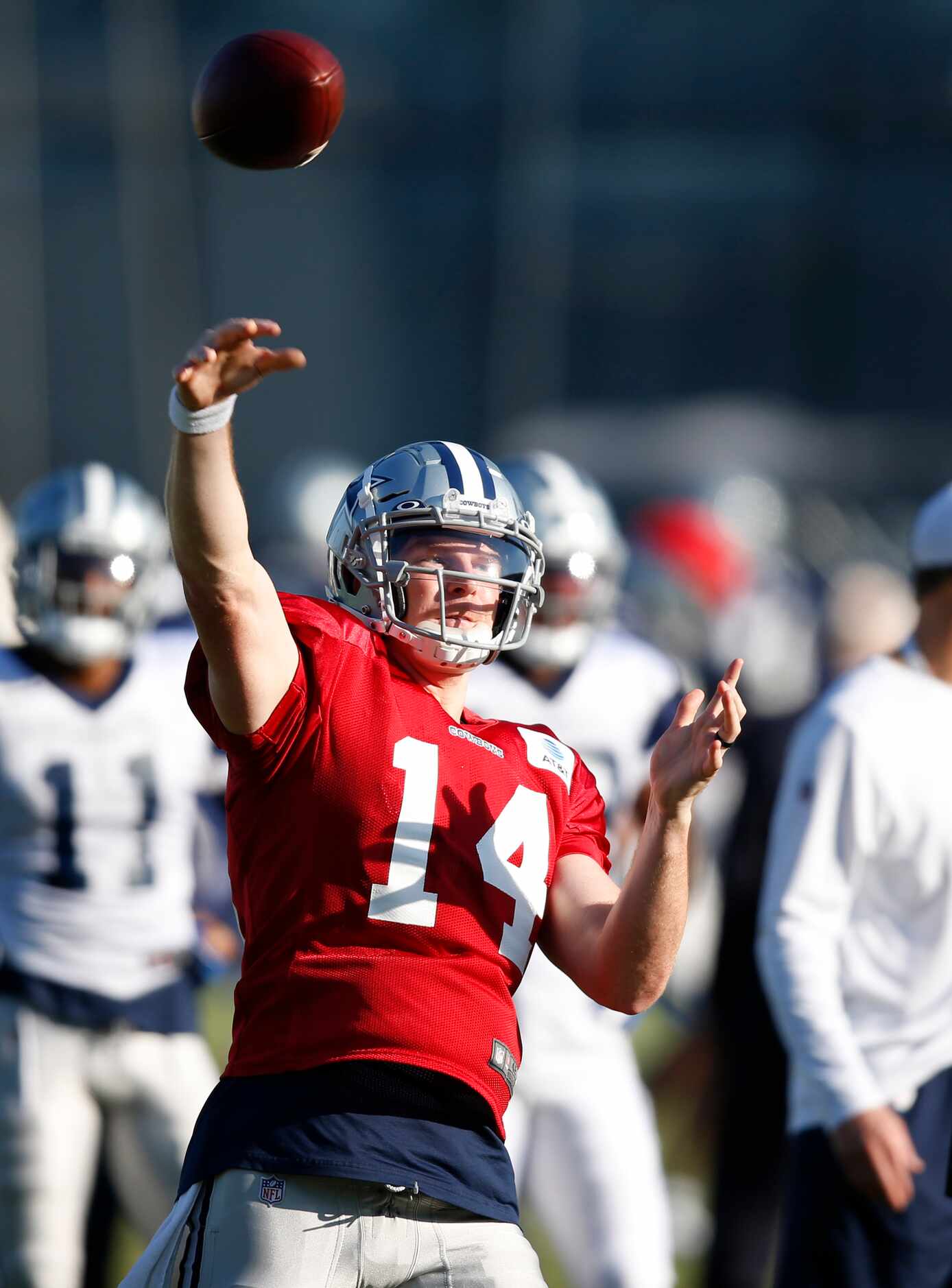 Dallas Cowboys quarterback Andy Dalton (14) attempts a pass in practice during training camp...