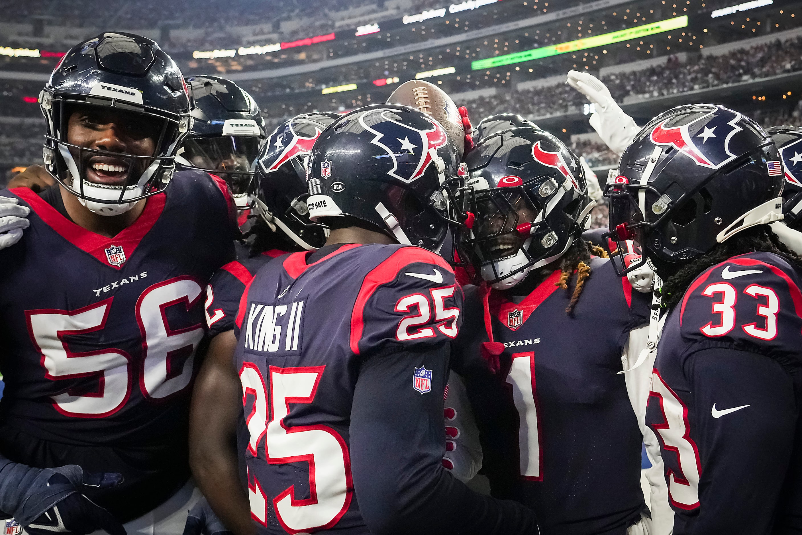 Houston Texans cornerback Tremon Smith (1) celebrates with teammates after intercepting a...