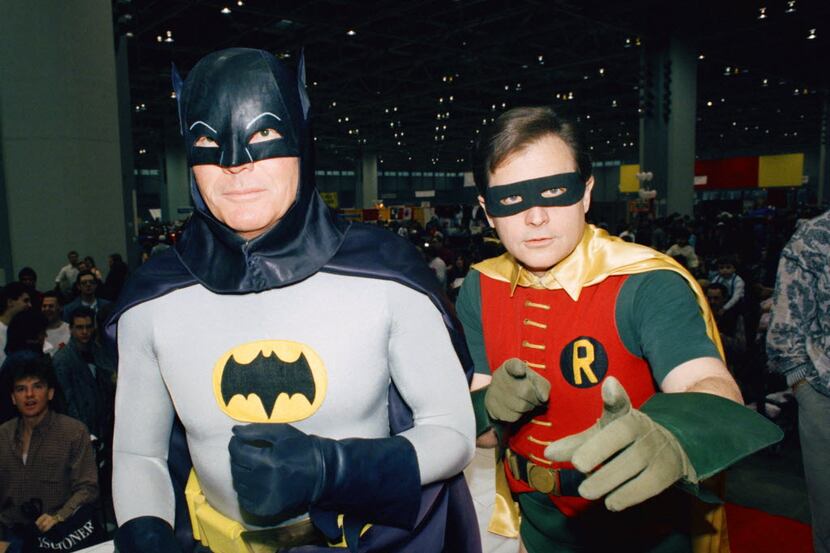 In this Jan. 27, 1989 file photo, actors Adam West, left, and Burt Ward dress as their...