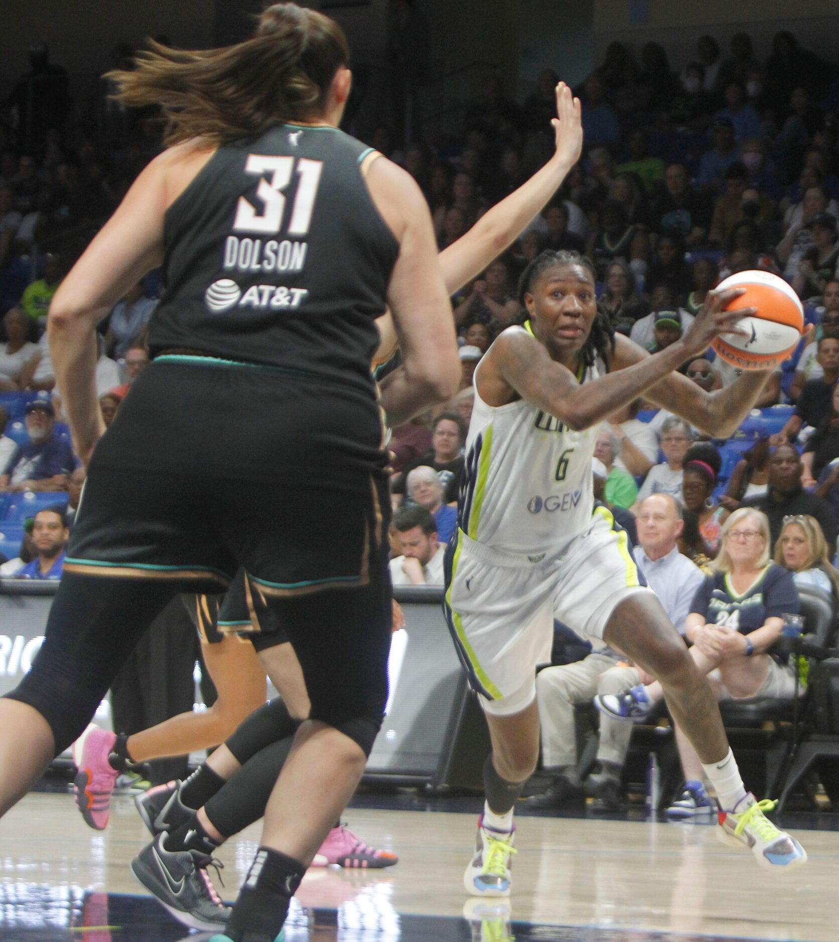 Dallas Wings guard Natasha Howard (6) drives to the basket as New York Liberty center...