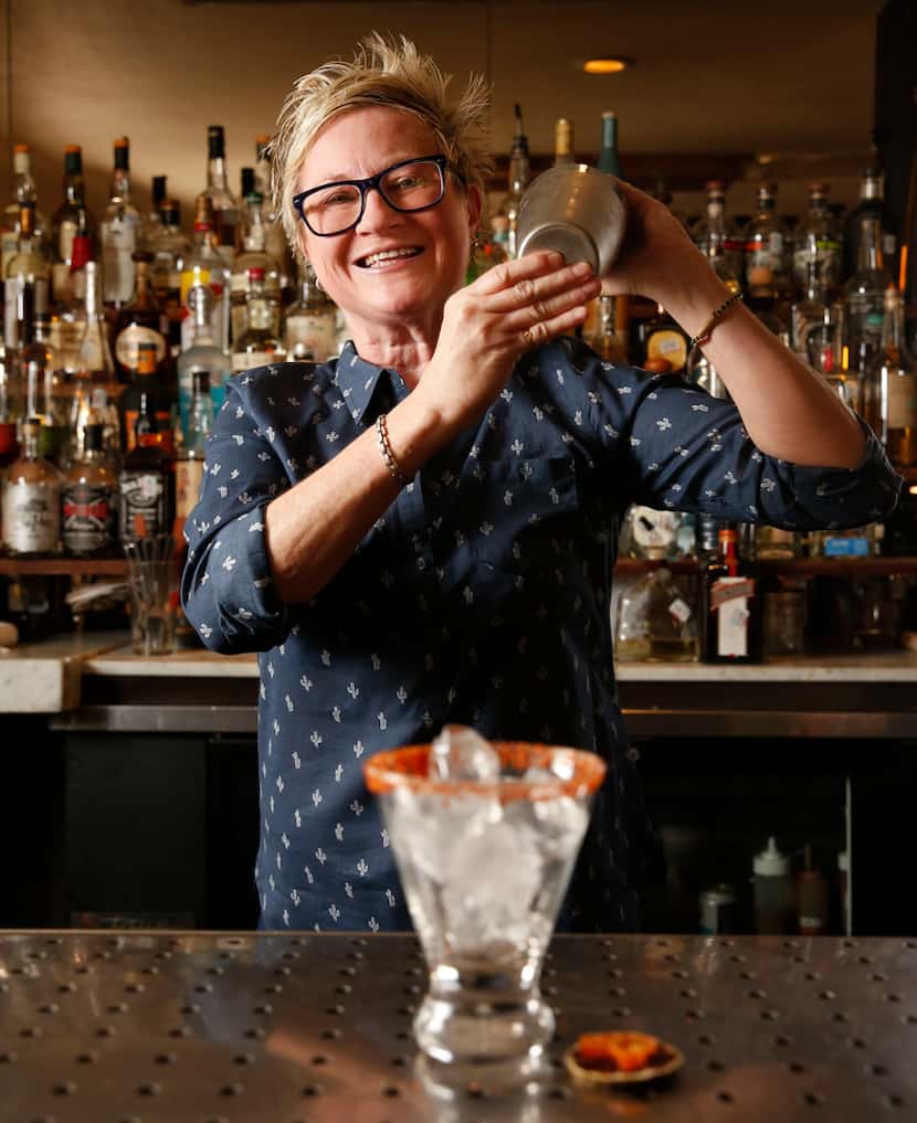 Leann Berry, mixologist at The Cedars Social, makes a sicar cocktail.
