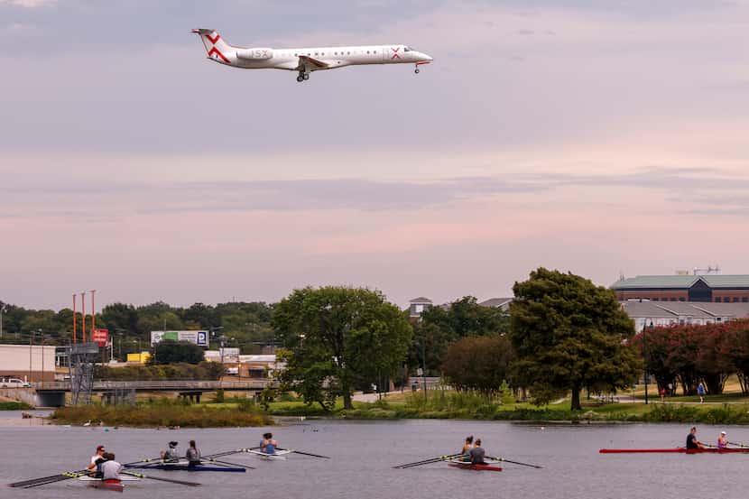 A JSX jet flew over Bachman Lake as it prepared to land at Dallas Love Field in 2021.