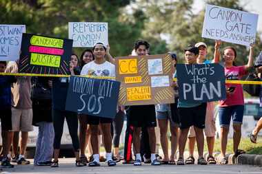 Cinco Ranch Canyon Gate subdivision residents demonstrated at a police roadblock outside...