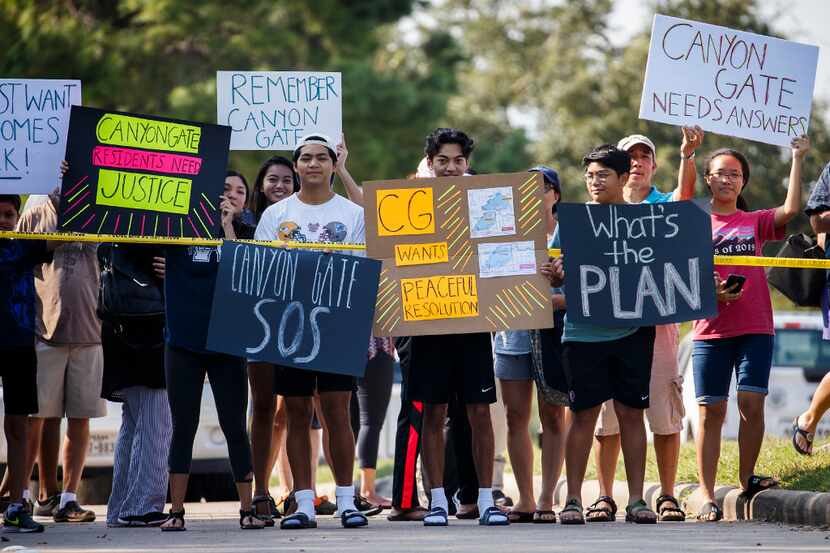 Cinco Ranch Canyon Gate subdivision residents demonstrated at a police roadblock outside...