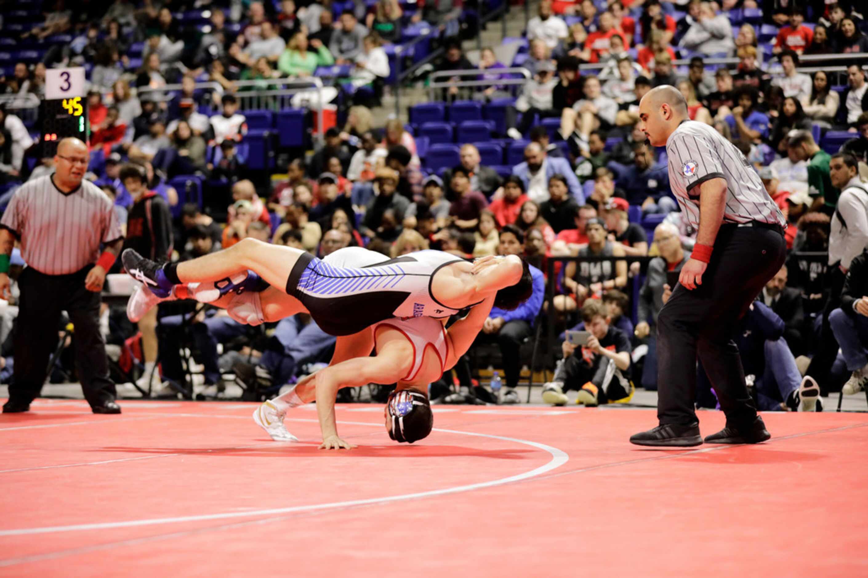 Mario Danzi of Allen wrestles during the UIL Texas State Wrestling Championships, Saturday,...