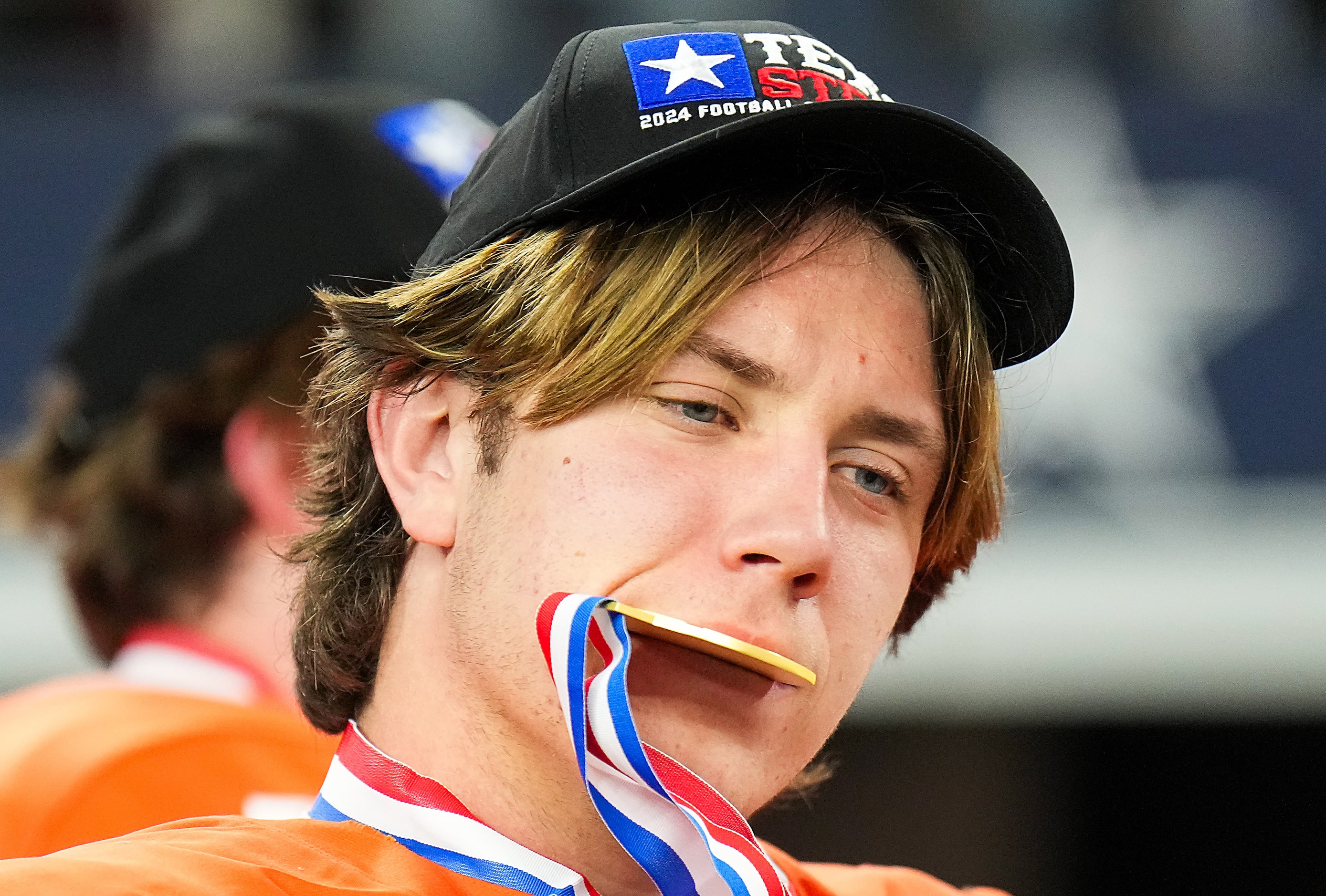 Celina's Bowe Bentley poses with his medal after a victory over Kilgore in the Class 4A...