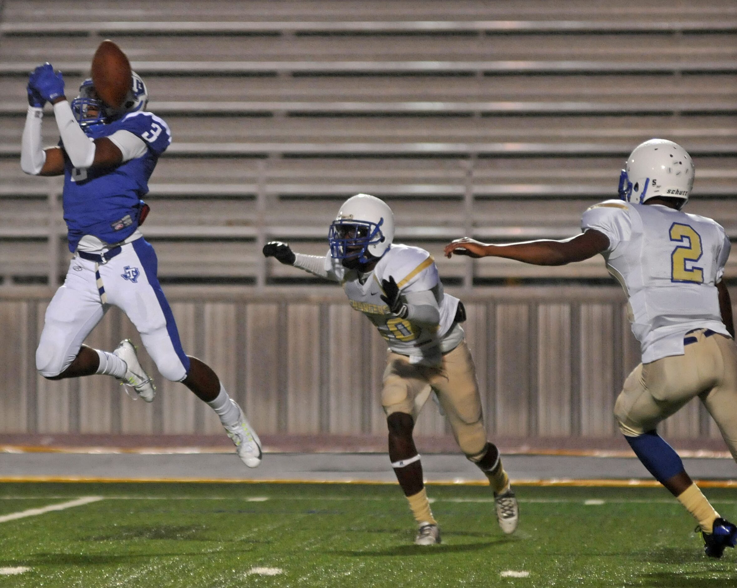 R.L. Turner senior Ken Francis (3) misses a pass that is intercepted by  Conrad senior...