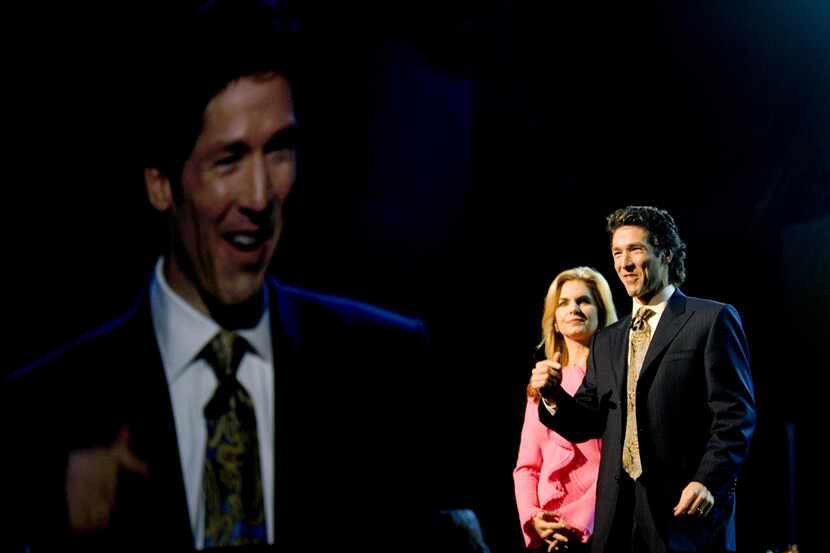 ORG XMIT: *S194DF442* 10/12/08 -- Joel Osteen and his wife Victoria preach at the American...